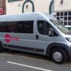 Minibus between venues for benefit of people with disabilities